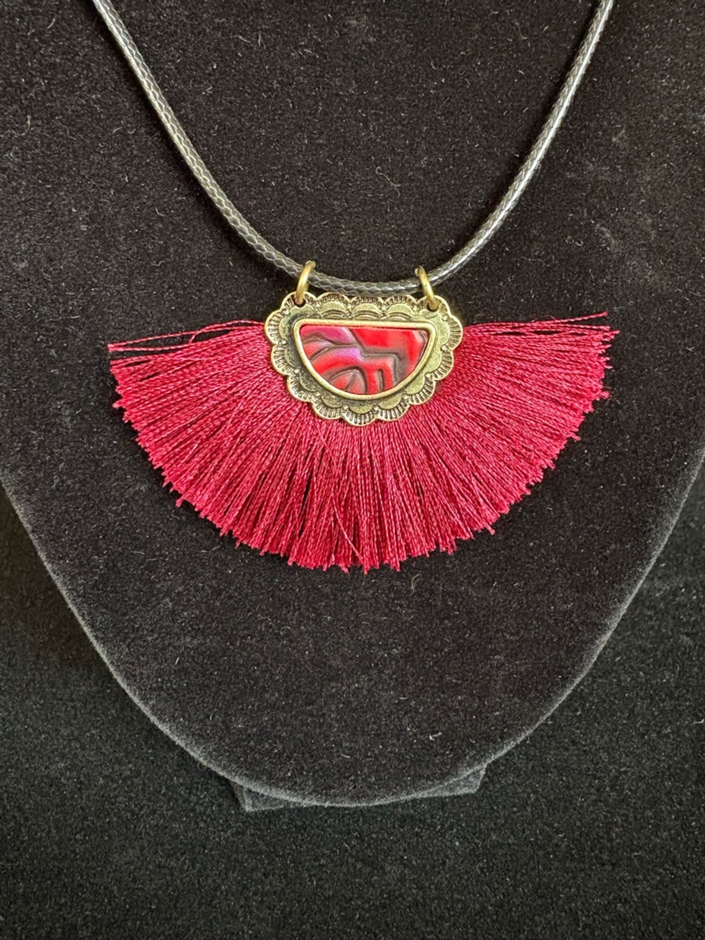 Burgundy Tassel Fan Pendant Necklace on a Black Leather Cord